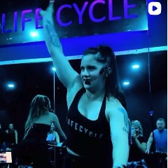 Life Cycle coach under neon