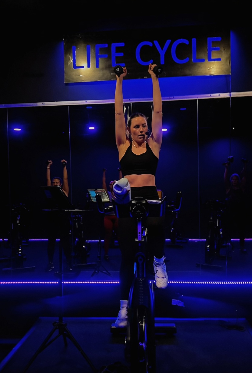 Hands up on the podium bike
